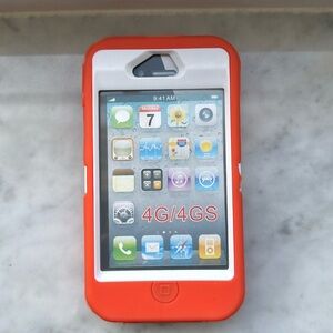 Orange over white defender case for iPhone 4/4s